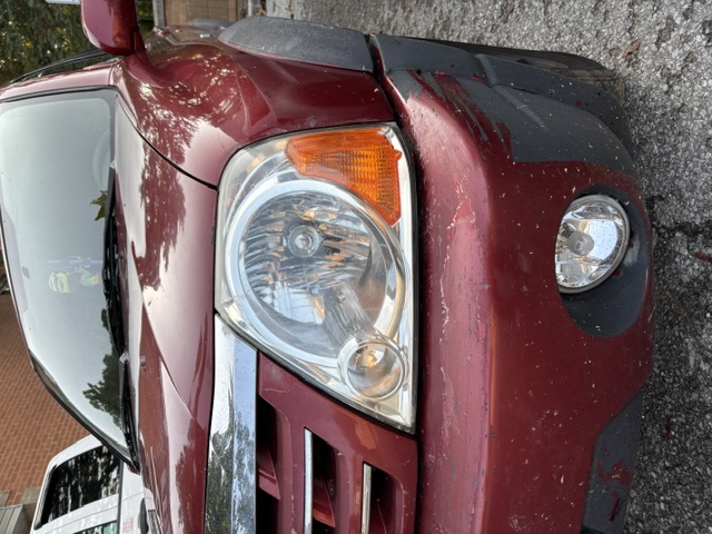 Suzuki XL-7 with clear headlight after restoration